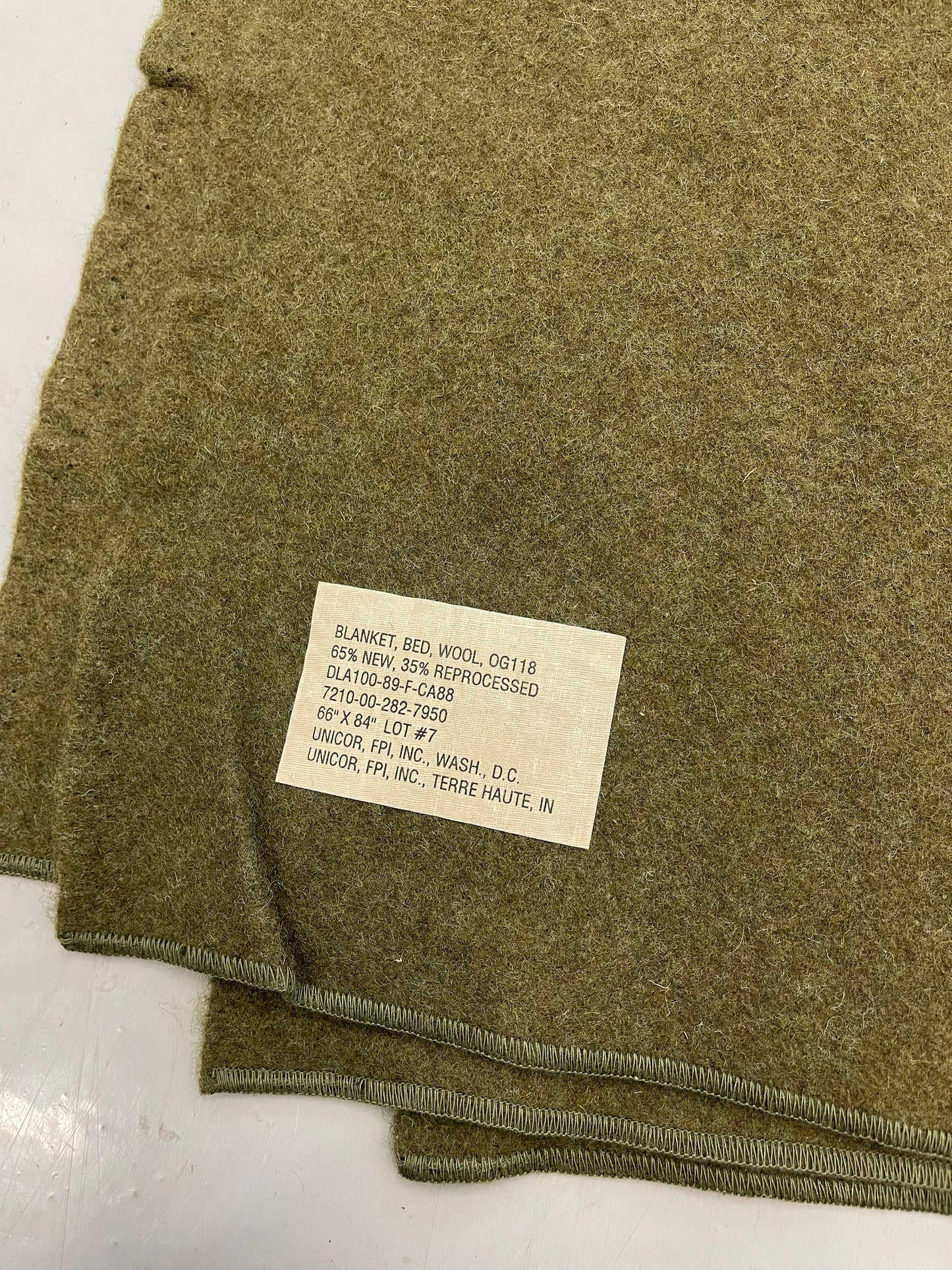 Genuine Vintage US Army 100 % wool blanket Olive drab/Green From Acceptable to New / Unused.