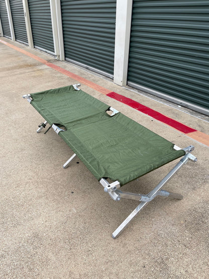 Genuine US military heavy duty steel frame sleeping folding camping cot new with Free US GI Laundry bag
