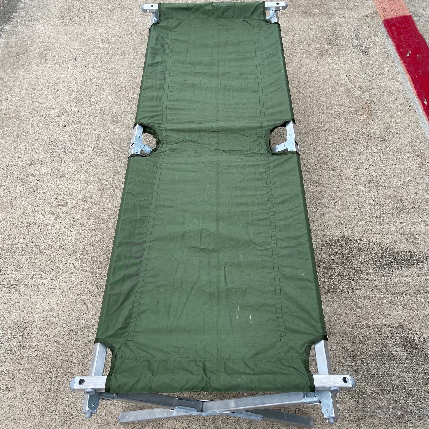 Genuine US military heavy duty steel frame sleeping folding camping cot new &   Mosquito Netting with poles and Free US GI Laundry bag.