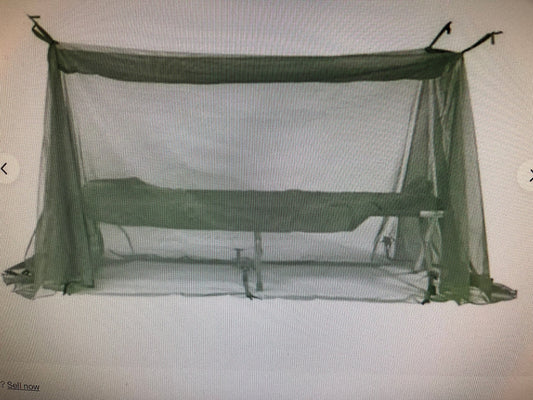 Genuine US military heavy duty steel frame sleeping folding camping cot new &   Mosquito Netting with poles and Free US GI Laundry bag.