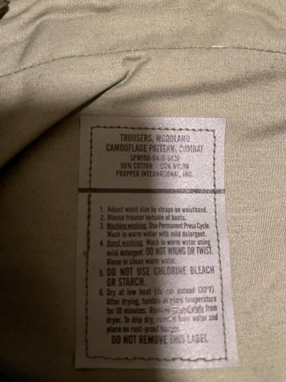 Genuine US military woodland camouflage nylon/Cotton 50/50 nyco pants Small Regular New.