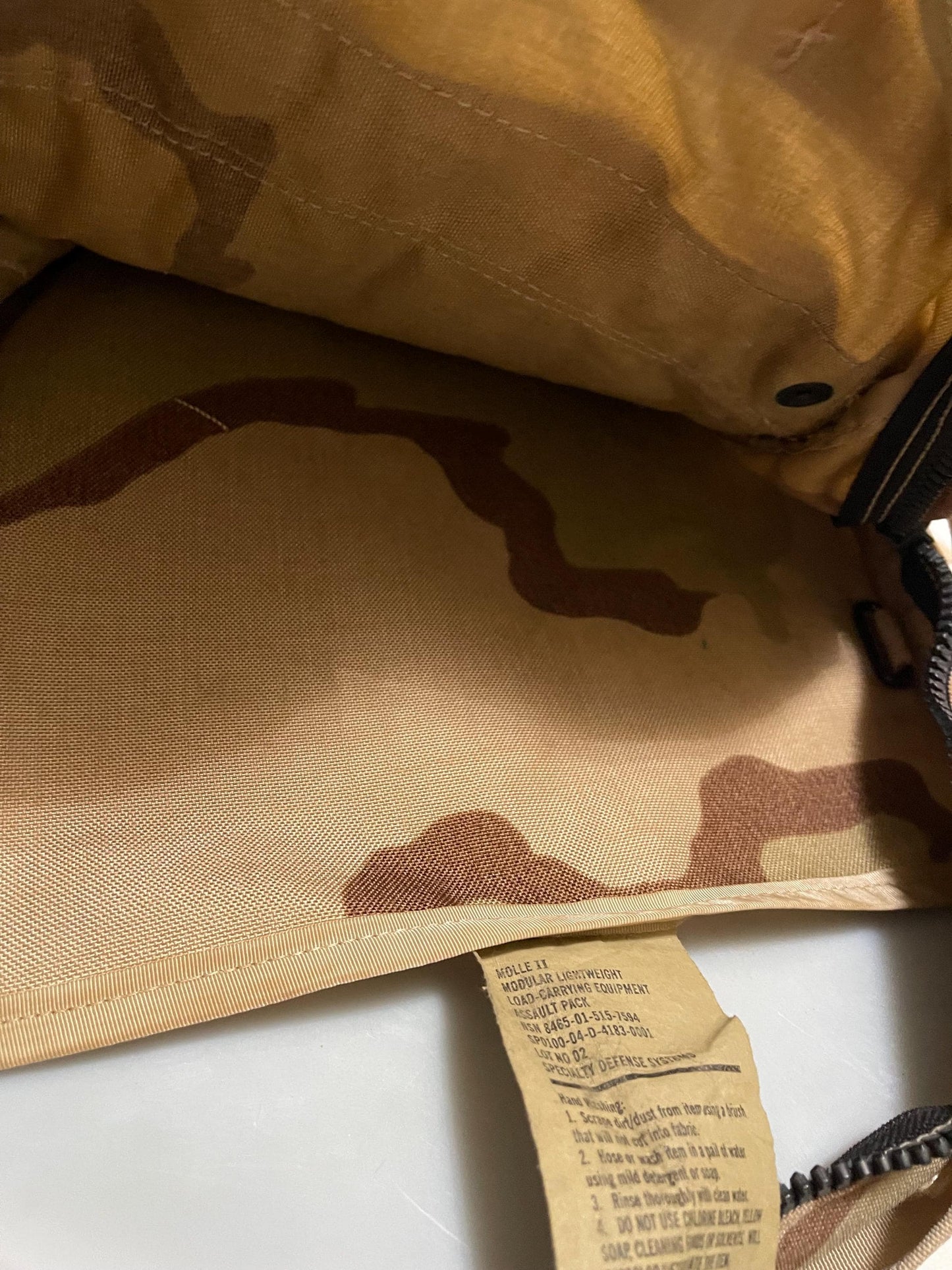 Genuine US Military Gulf war era Desert camouflage 3 days assault pack with soft Pad & hard stiffener  Condition: Very Good.