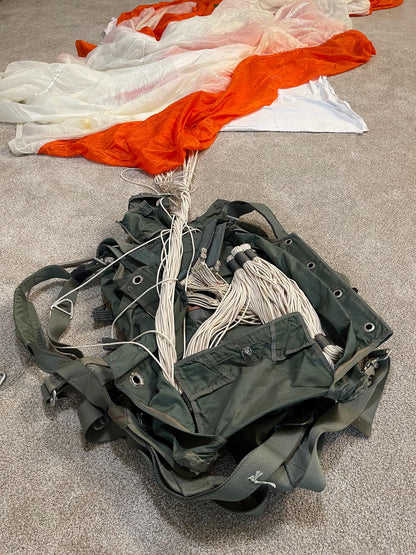 US military 28 ft. Round Orange and white Nylon Parachute with harness , lines and small white chute,