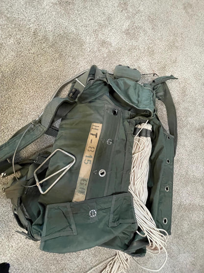 US military 28 ft. Round Orange and white Nylon Parachute with harness , lines and small white chute,