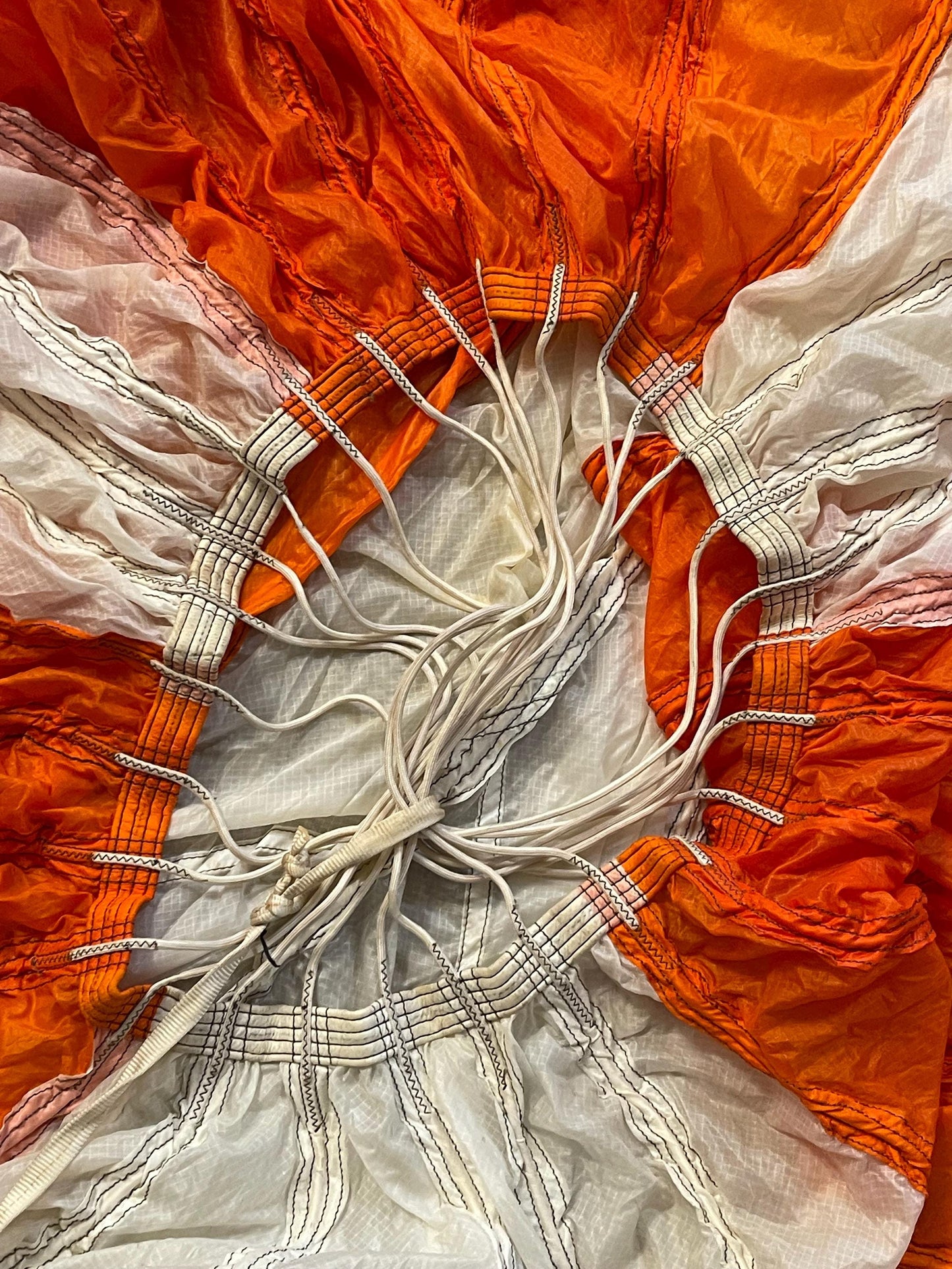 US military 28 ft. Round Orange and white Nylon Parachute with harness , lines and small white chute,