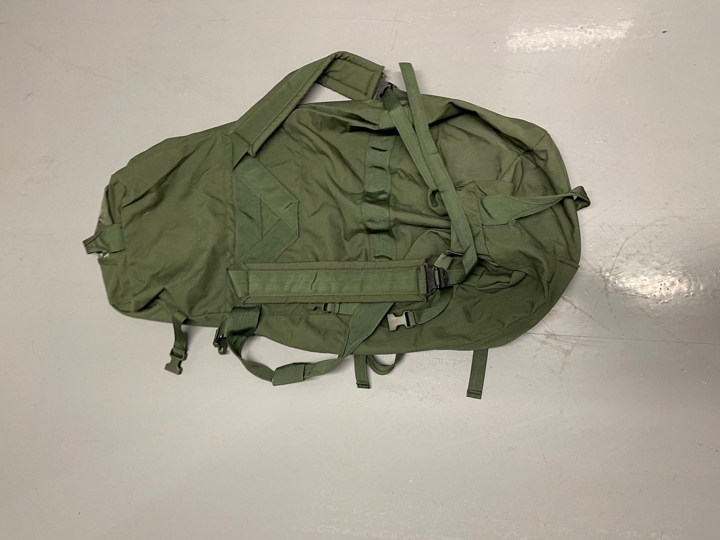 Genuine US Military OD green Improved duffle bag with backpack shoulder straps.