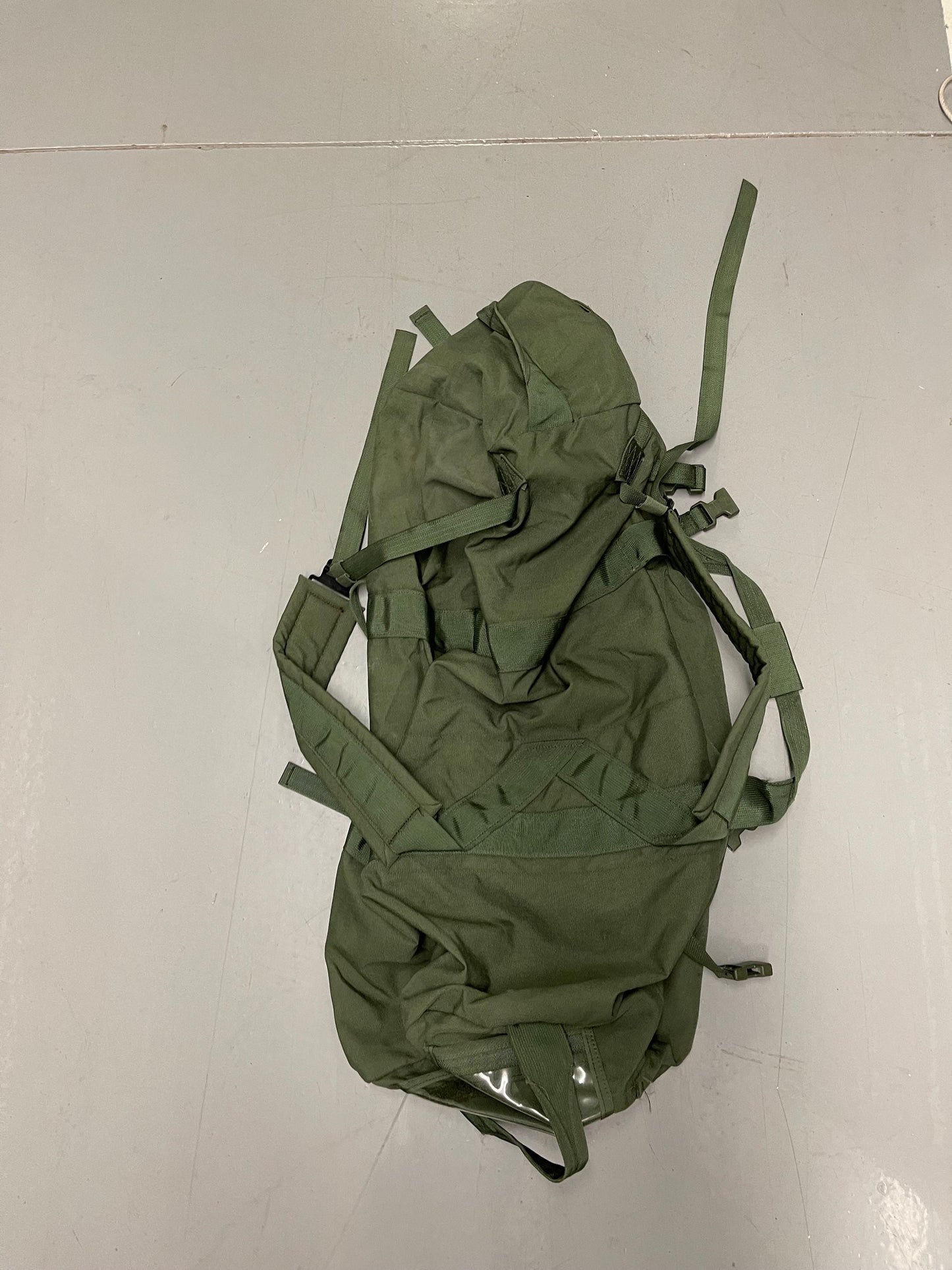 Genuine US Military OD green Improved duffle bag with backpack shoulder straps.