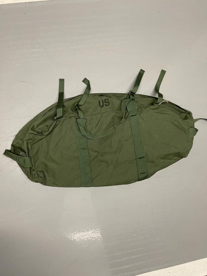 Genuine US Military OD green Improved duffle bag with backpack shoulder straps.