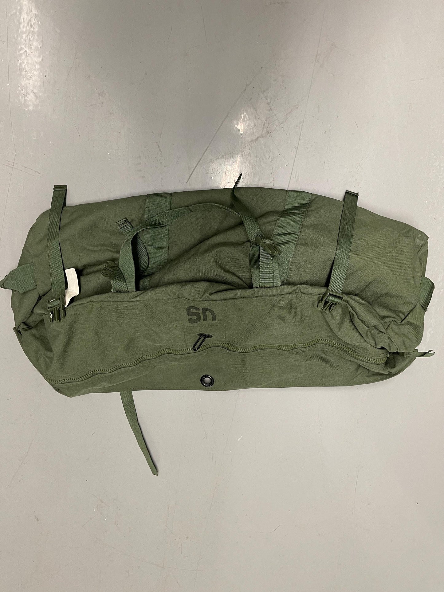 Genuine US Military OD green Improved duffle bag with backpack shoulder straps.
