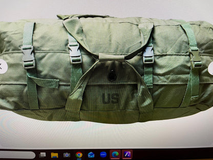 Genuine US Military OD green Improved duffle bag with backpack shoulder straps.